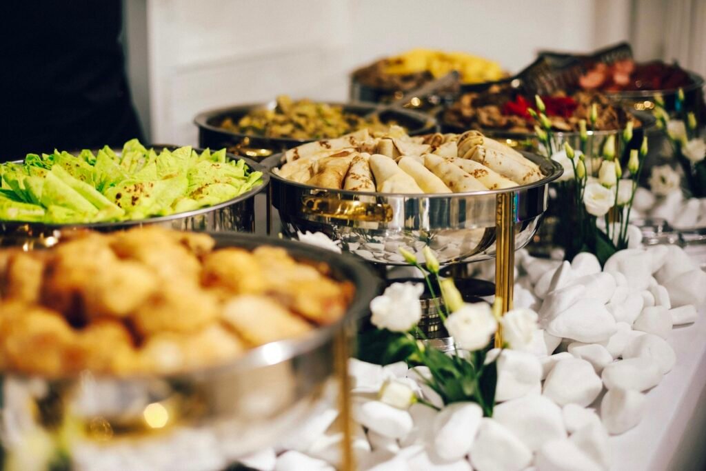 Corporate catering buffet counter with hot chafing dishes